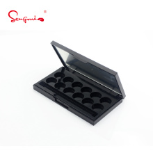 6g*12 colores Nuevo diseño Paleta de sombras de ojo de plástico negro Recipiente personalizado vacío con espejo para empaques cosméticos